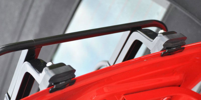 black car luggage rack clamps close