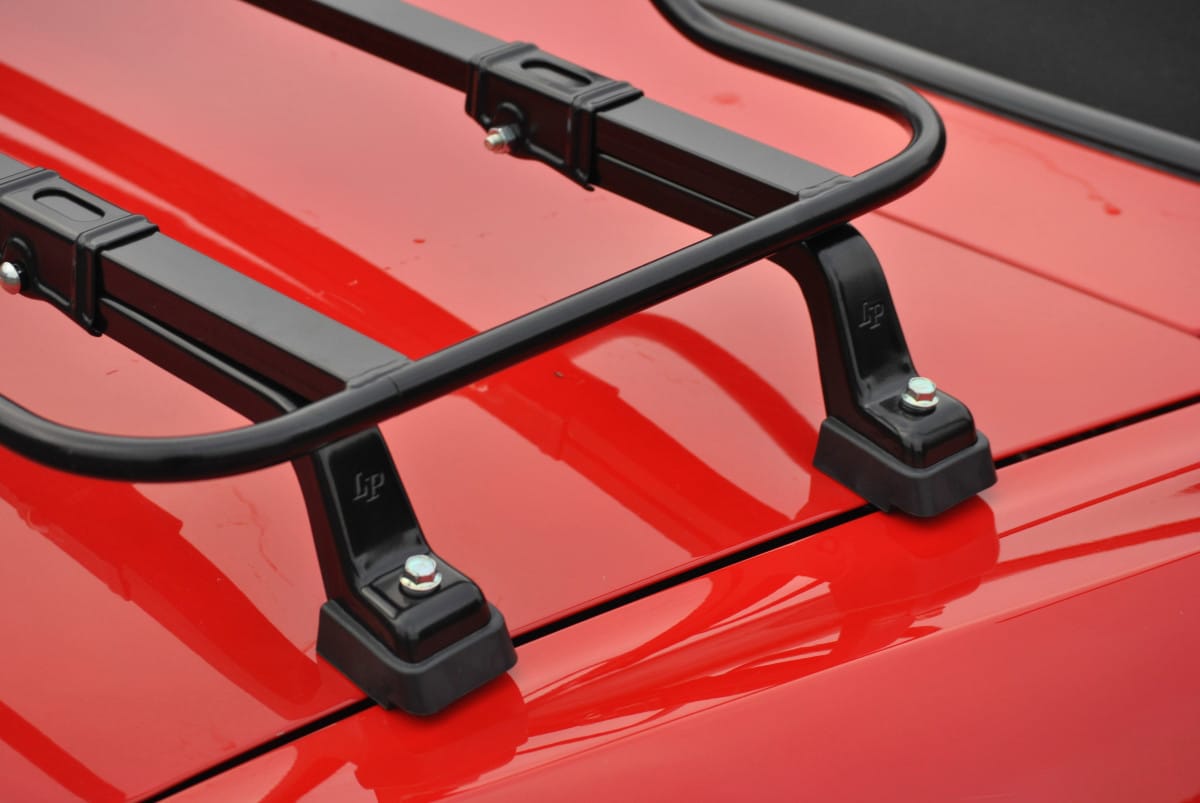 black car luggage rack clamps on boot lid